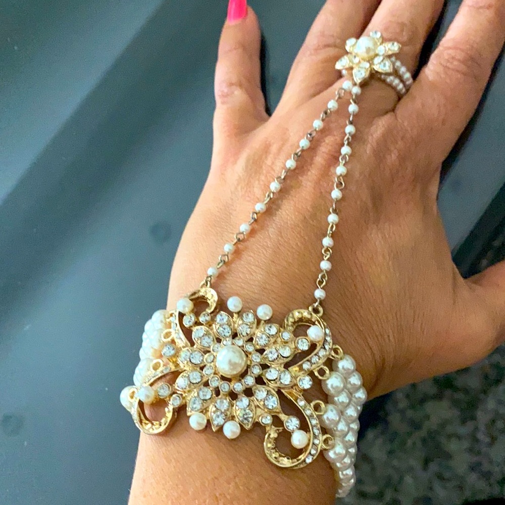 Pear bracelets with attached ring